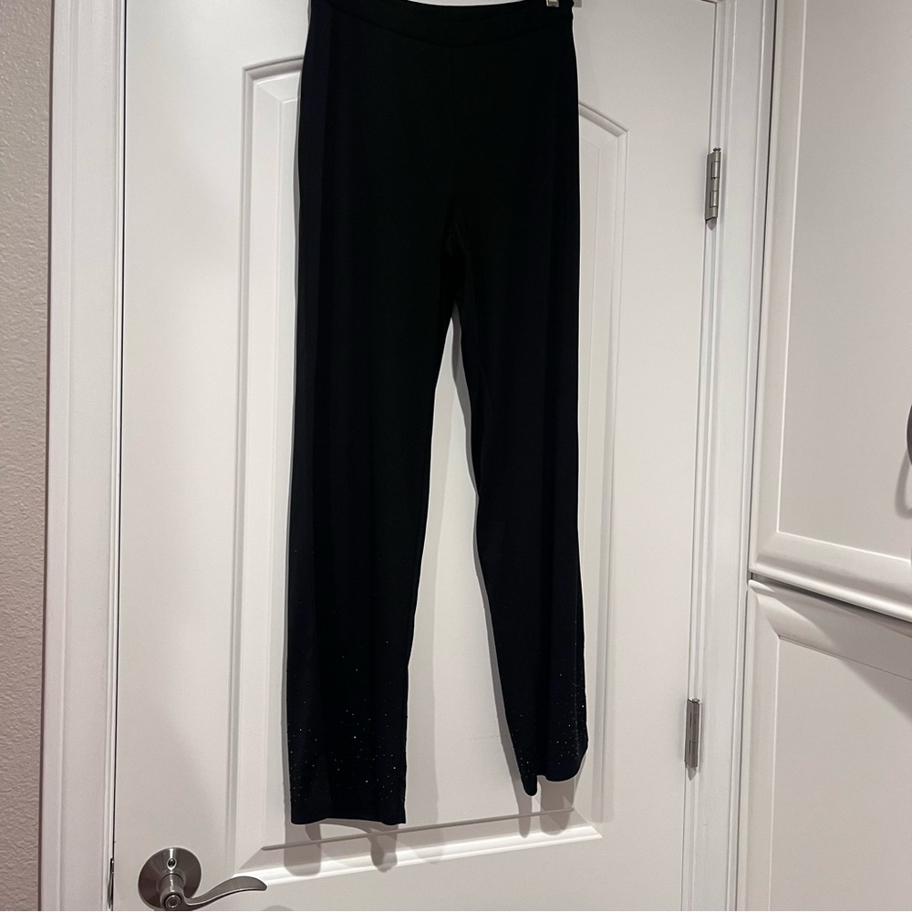 Ann Taylor dress pants with black diamonds on the bottom of the legs